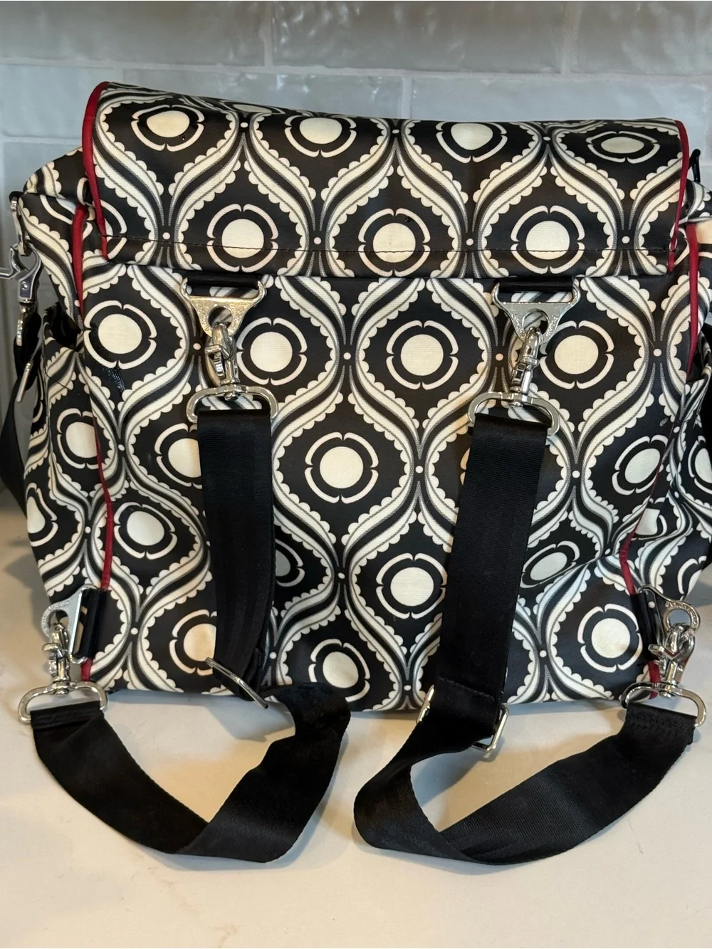 Petunia Pickle Bottom Black & White Geometric Baby Bag with Red Accent